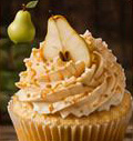 Cupcake with caramel drizzle and pear garnish